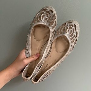 Silver rose cut out flats size 9